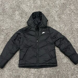 Black Nike kids puffer size XL.